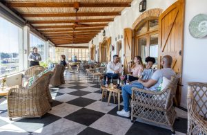 De Grendal Outdoor restaurant with customers enjoying the view. De Grendal Outdoor restaurant