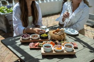 Diemersdal Wine Estate platters and pairings with wine on the patio. Diemersdal Wine Estate platters and pairings