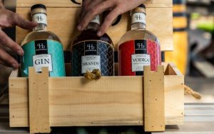 Houtbosch Wines and gin offerings on display in their packaging.